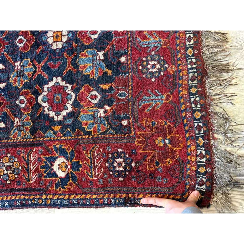 Rare antique Khamseh Persian rug 1920s, full field view showing low pile and natural dye colors