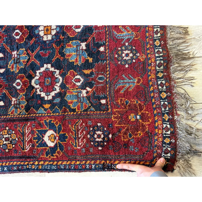 Rare antique Khamseh Persian rug 1920s, full field view showing low pile and natural dye colors