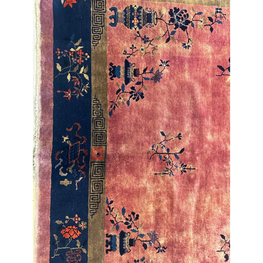 Stunning 1920s Chinese Art Deco rug in coral pink with blue floral vase motifs