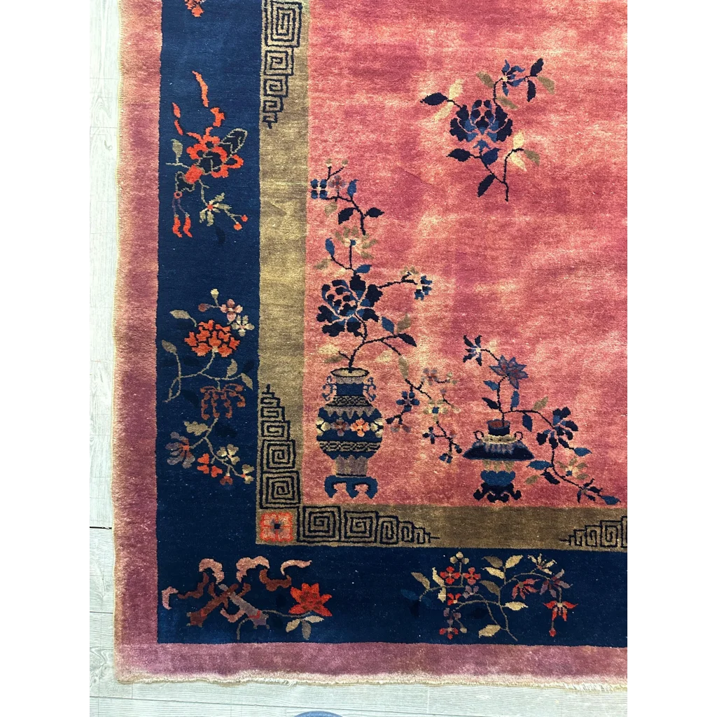 Vibrant 1920s Chinese art deco rug with pink field and floral vase motifs