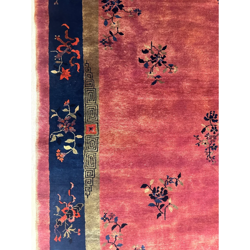 Stunning 1920s Chinese art deco rug with pink floral patterns and blue border