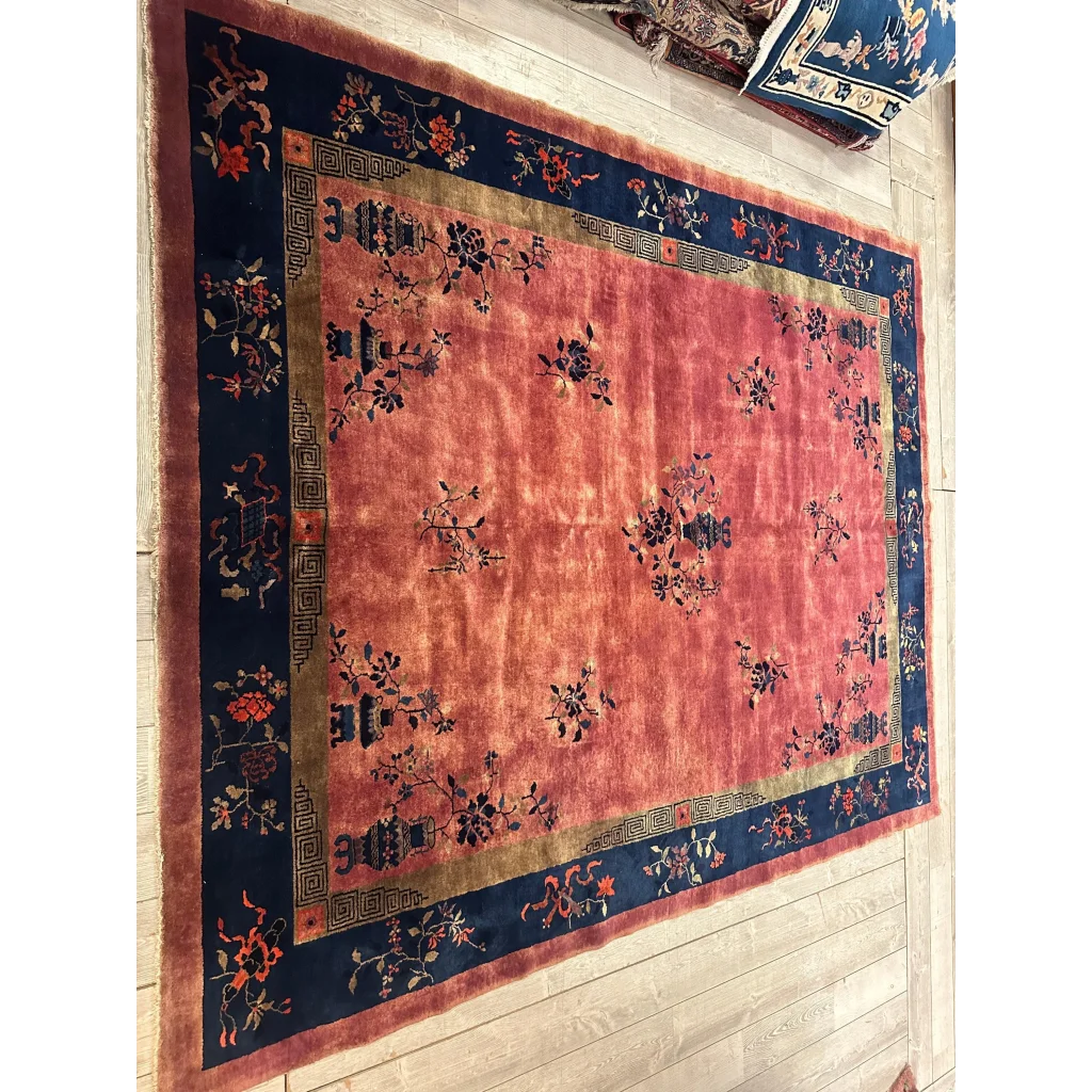 Vintage Chinese art deco rug with faded coral field and floral motifs