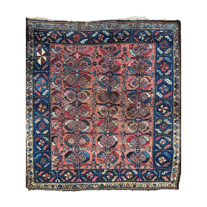 Rare 1920s Persian Hamedan Enjelas wool rug, full view, pink ground with vibrant floral motifs