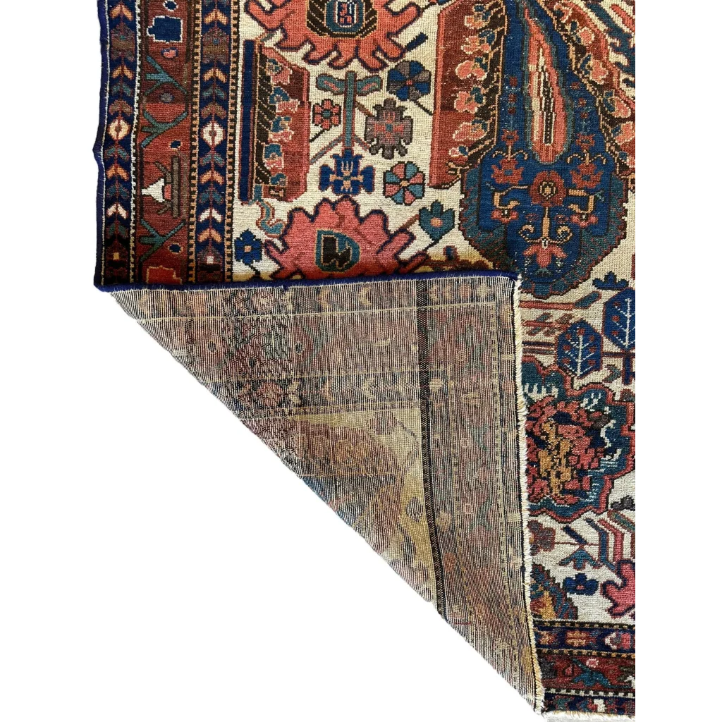 Stunning 1920s Persian Malayar rug with cotton foundation and intricate floral patterns