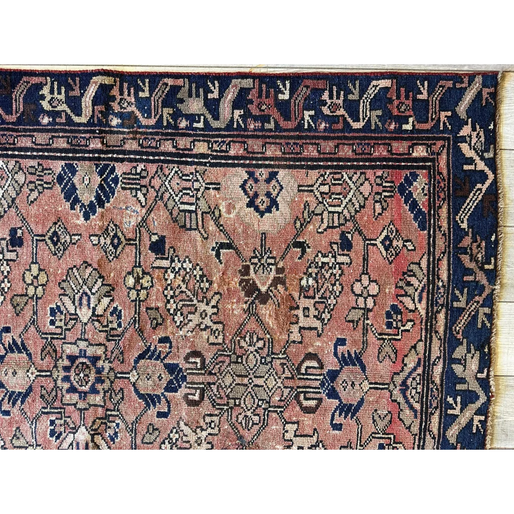 Stunning 1930s Persian Lilihan runner with faded pink, navy, and beige patterns