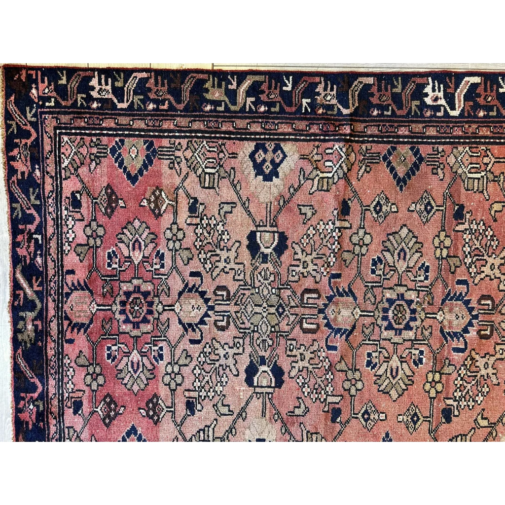 Vintage 1930s Persian Lilihan runner with faded pink navy wool motifs