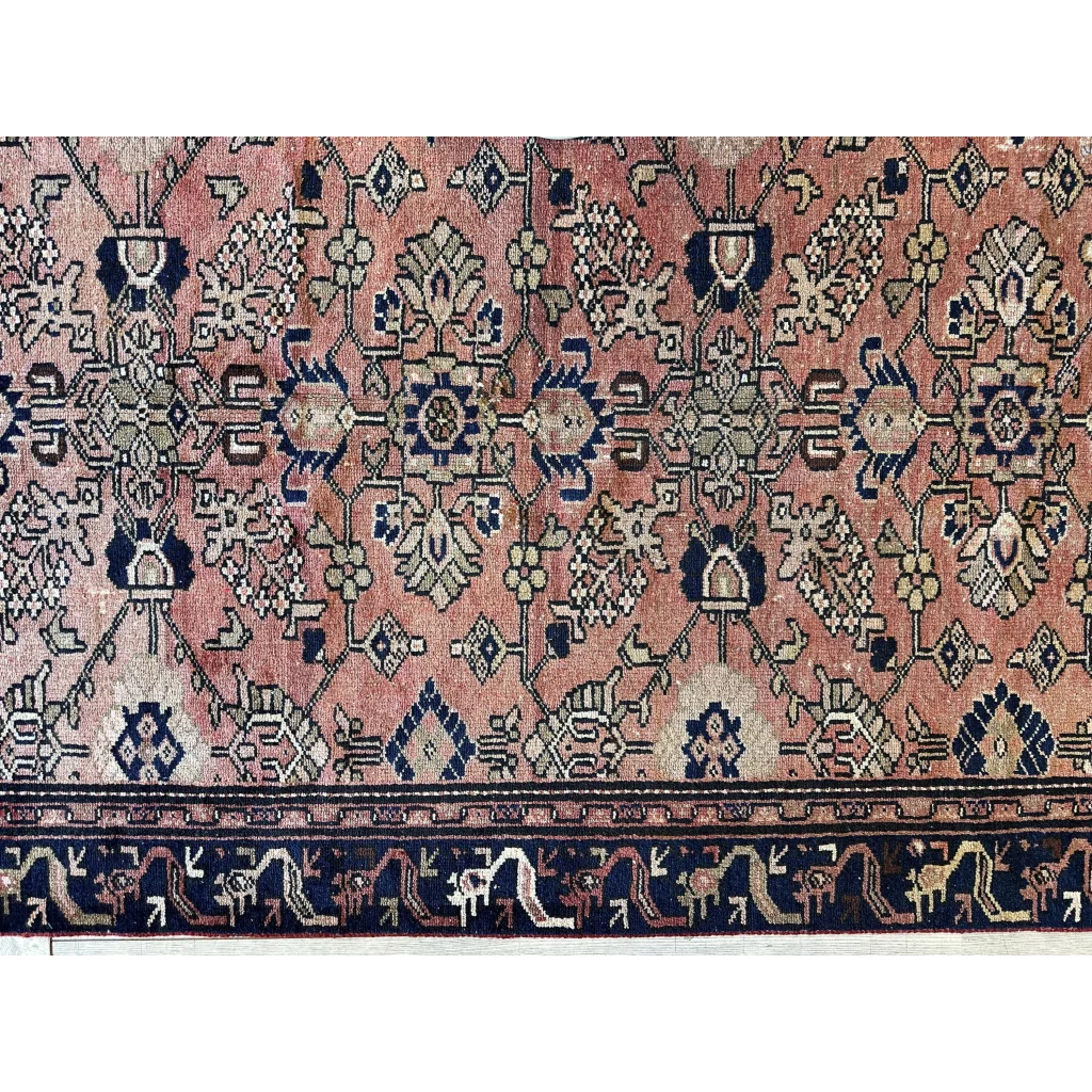 Vintage 1930s Persian Lilihan runner in faded pink and navy geometric patterns