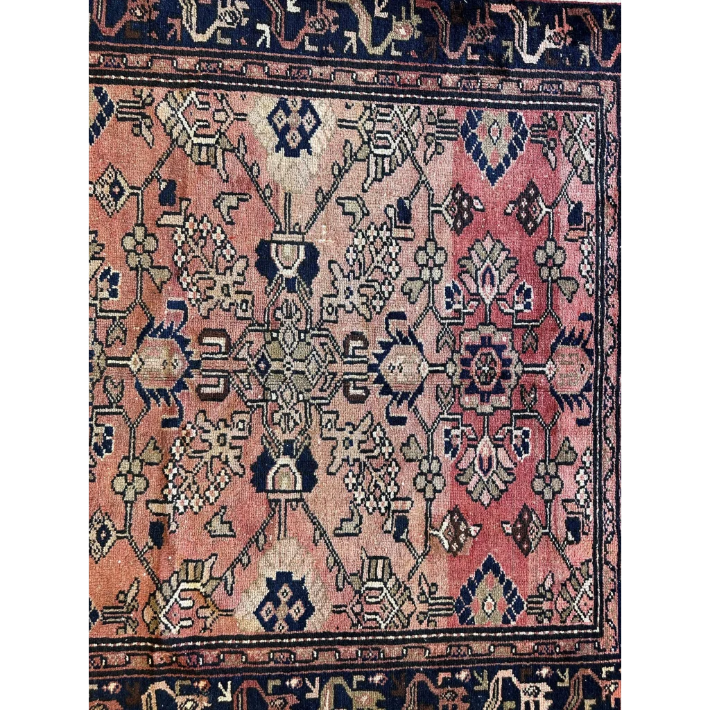 Vintage 1930s Persian Lilihan runner rug in faded pink and navy wool patterns