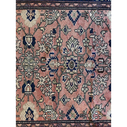 Vintage 1930s Persian Lilihan runner in faded pink with navy geometric floral patterns