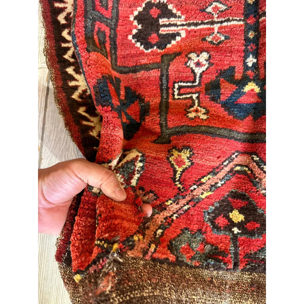 Vintage 1950s Persian tribal bagface in red and black with natural wool pile