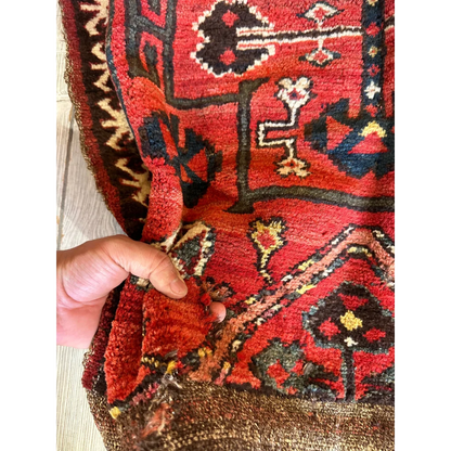 Vintage 1950s Persian tribal bagface in red and black with natural wool pile