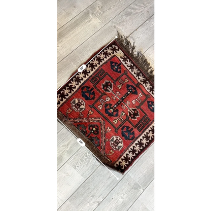 Vintage 1950s Persian tribal bagface rug with geometric designs in natural wool