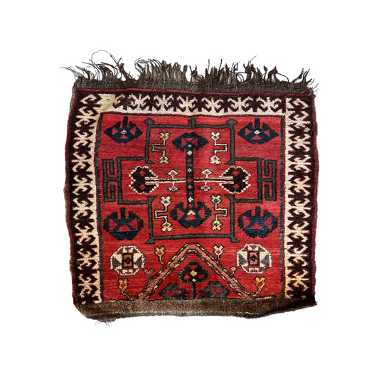 Vibrant 1950s Persian natural wool pile bagface rug with geometric floral patterns