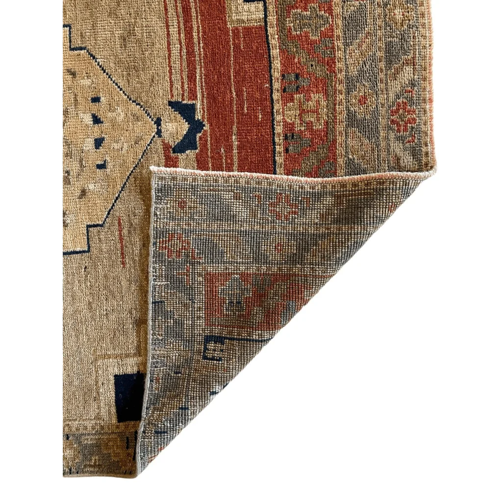 Vintage 1950s Turkish Oushak wool rug with faded beige, rust-red, navy medallion