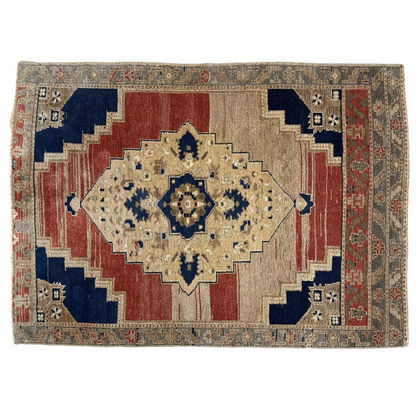 1950s Turkish Oushak wool rug with cream navy medallion and red stripes