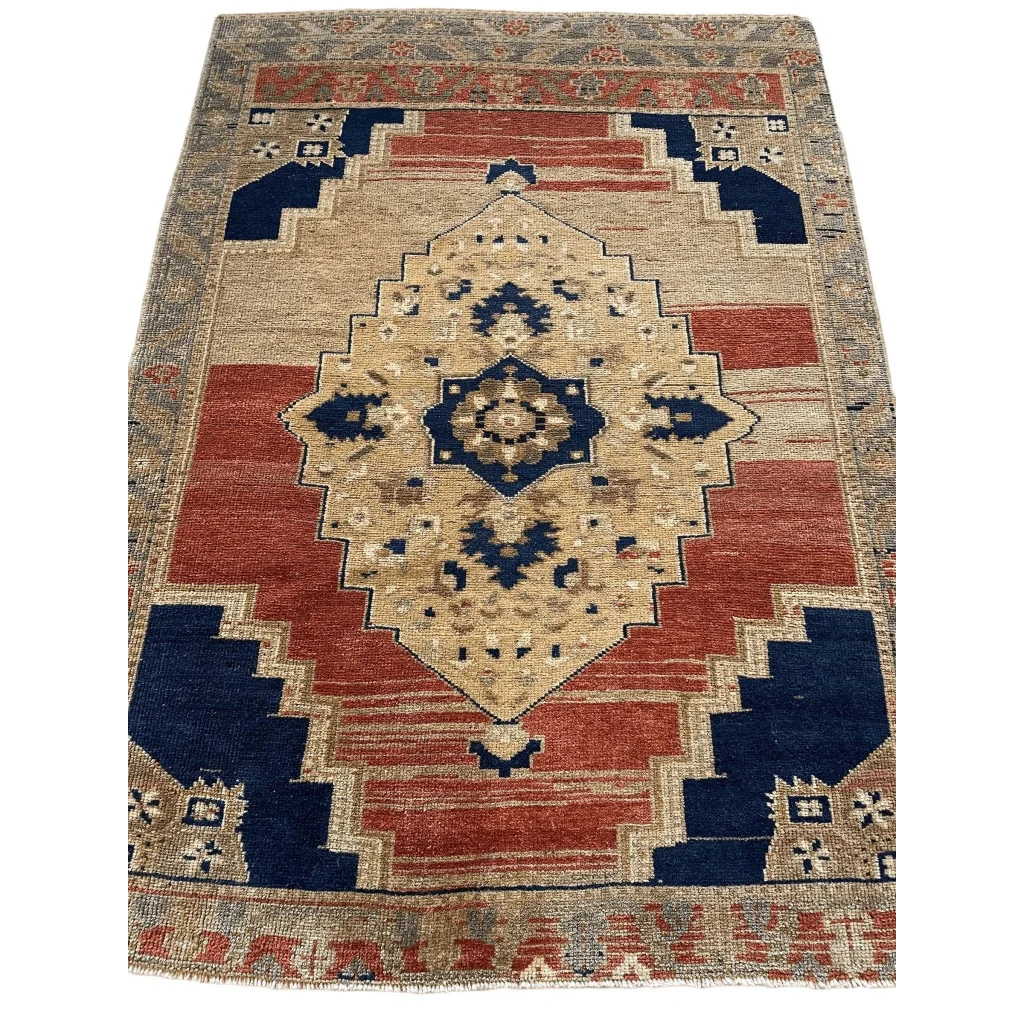 Vintage 1950s Turkish Oushak wool rug with bold diamond medallion