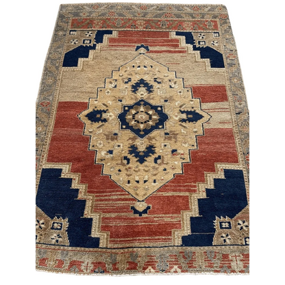Vintage 1950s Turkish Oushak wool rug with bold diamond medallion
