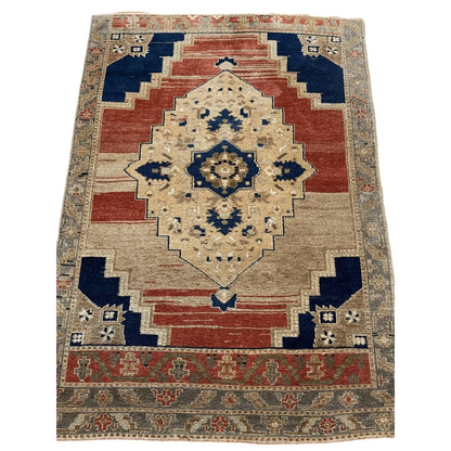 1950s Turkish Oushak wool rug with cream navy diamond medallion