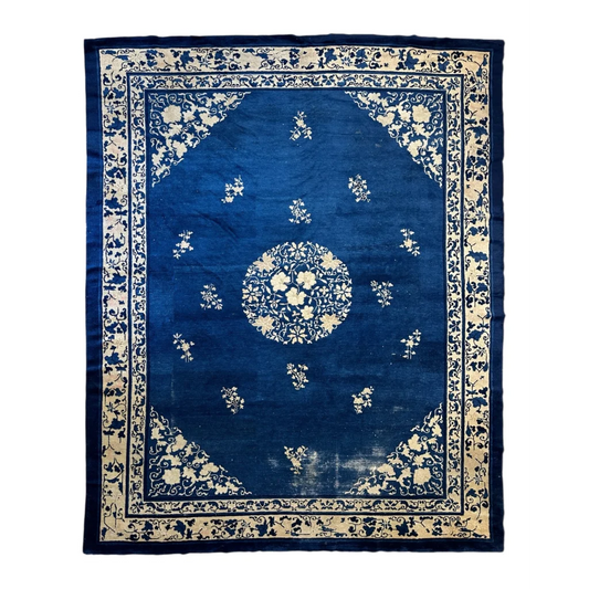 Stunning 19th century Chinese Peking rug in deep blue silk with cream floral patterns