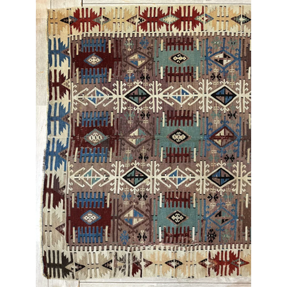 Stunning 19th century Turkish Reyhanli kilim rug with intricate geometric patterns in earthy brown, blue, red, and cream tones