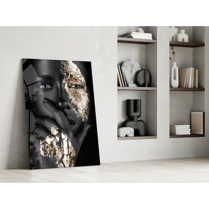 Black and gold abstract face wall art on canvas with textured details