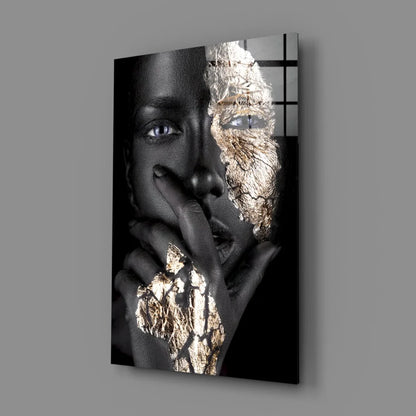 Black and gold abstract face wall art with textured gold details