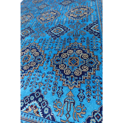 Stunning Afghan Blue Zerkhaki rug with vibrant patterns and cotton foundation