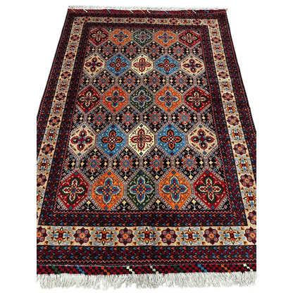 Stunning Afghan Kashi rug with cotton foundation and vibrant patterns