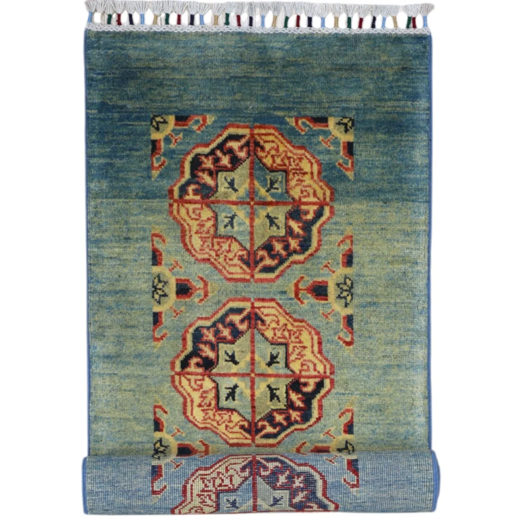 Handwoven Afghan Kazak runner in blue green with geometric patterns and cotton foundation fringe