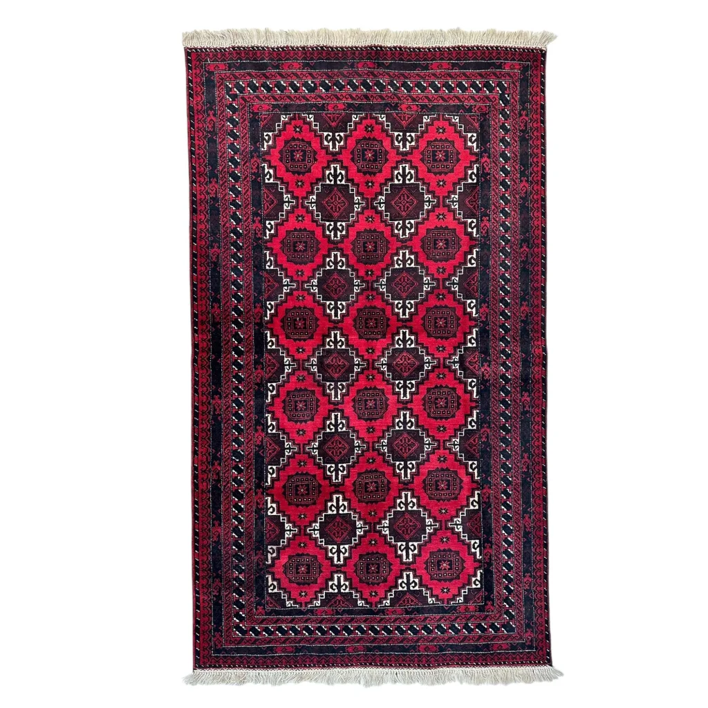 Afghan Baluch hand-knotted wool rug with red and black geometric tribal patterns