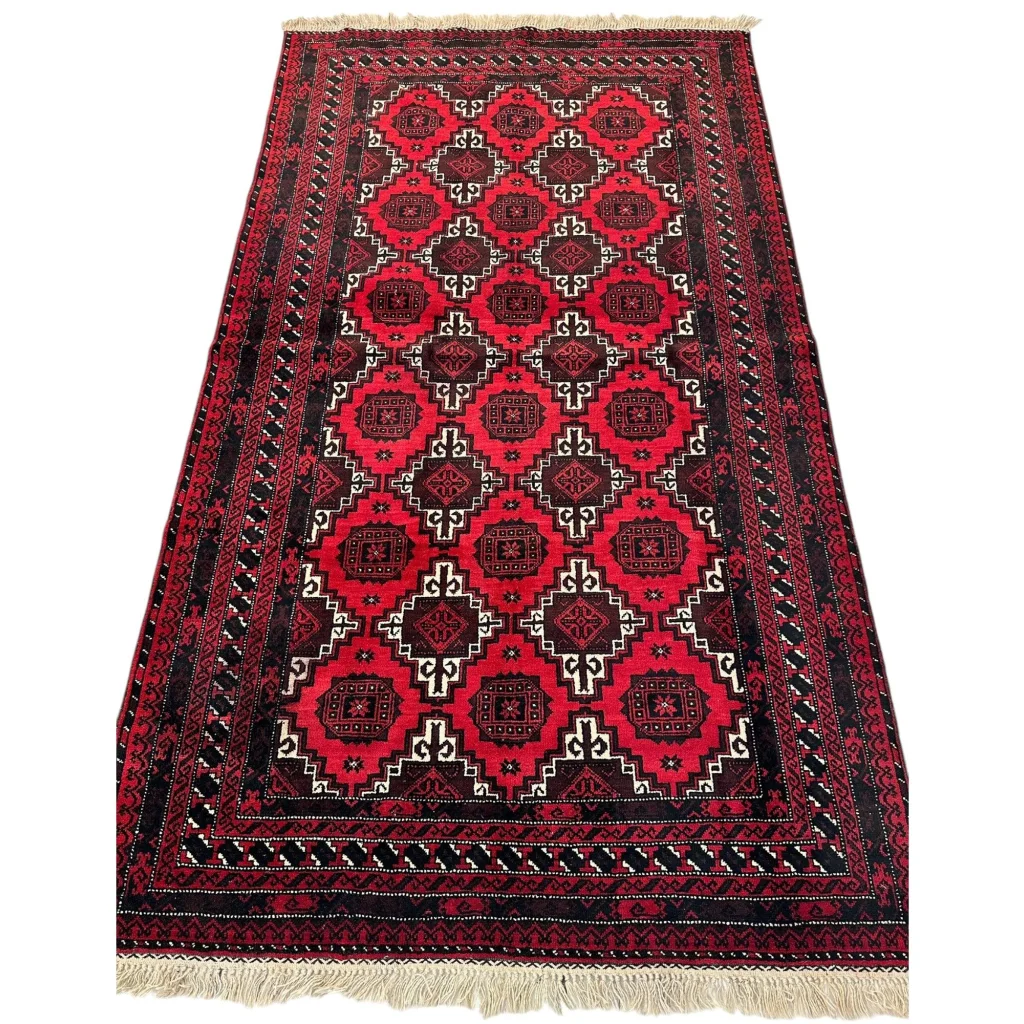 Afghan Baluch hand-knotted wool rug in red and black with geometric tribal design