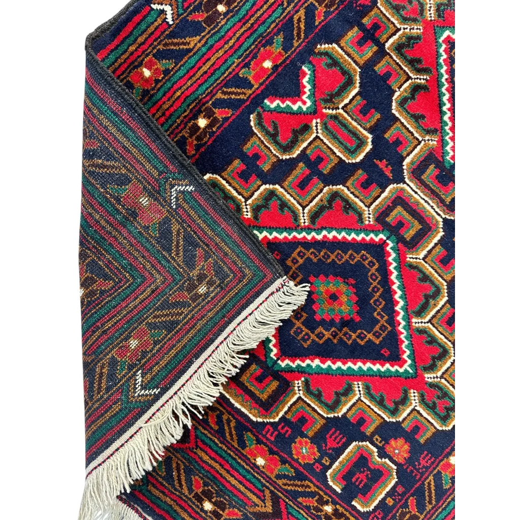 Stunning Afghani Baluch wool rug with vibrant geometric patterns for small spaces