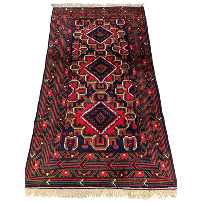 Stunning Afghani Baluch wool rug with red navy geometric patterns for small spaces