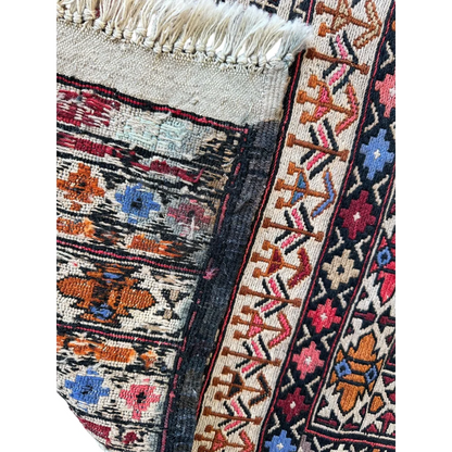 Vibrant Afghani Maliki Soumak rug with bold geometric patterns
