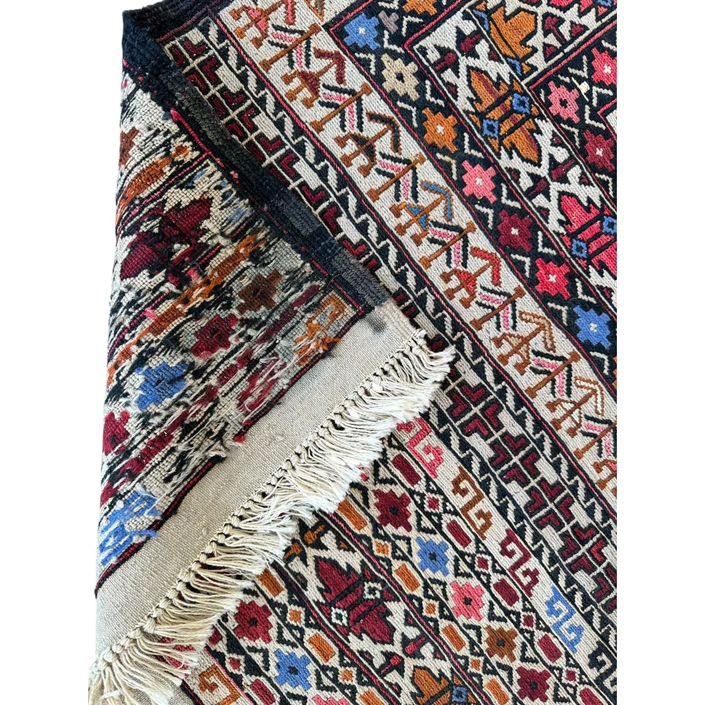 Stunning Afghani Maliki Soumak rug with vibrant geometric patterns