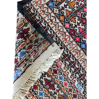 Stunning Afghani Maliki Soumak rug with vibrant geometric patterns