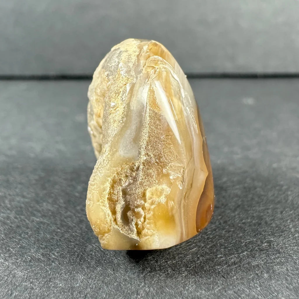 Stunning amber agate gemstone with golden swirls