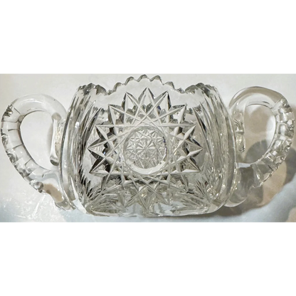 American brilliant cut glass sugar bowl with handles and sawtooth rim from the Gilded Age