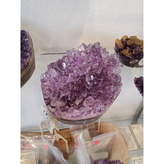 Vibrant amethyst flower formation geode sculpture with sparkling crystals