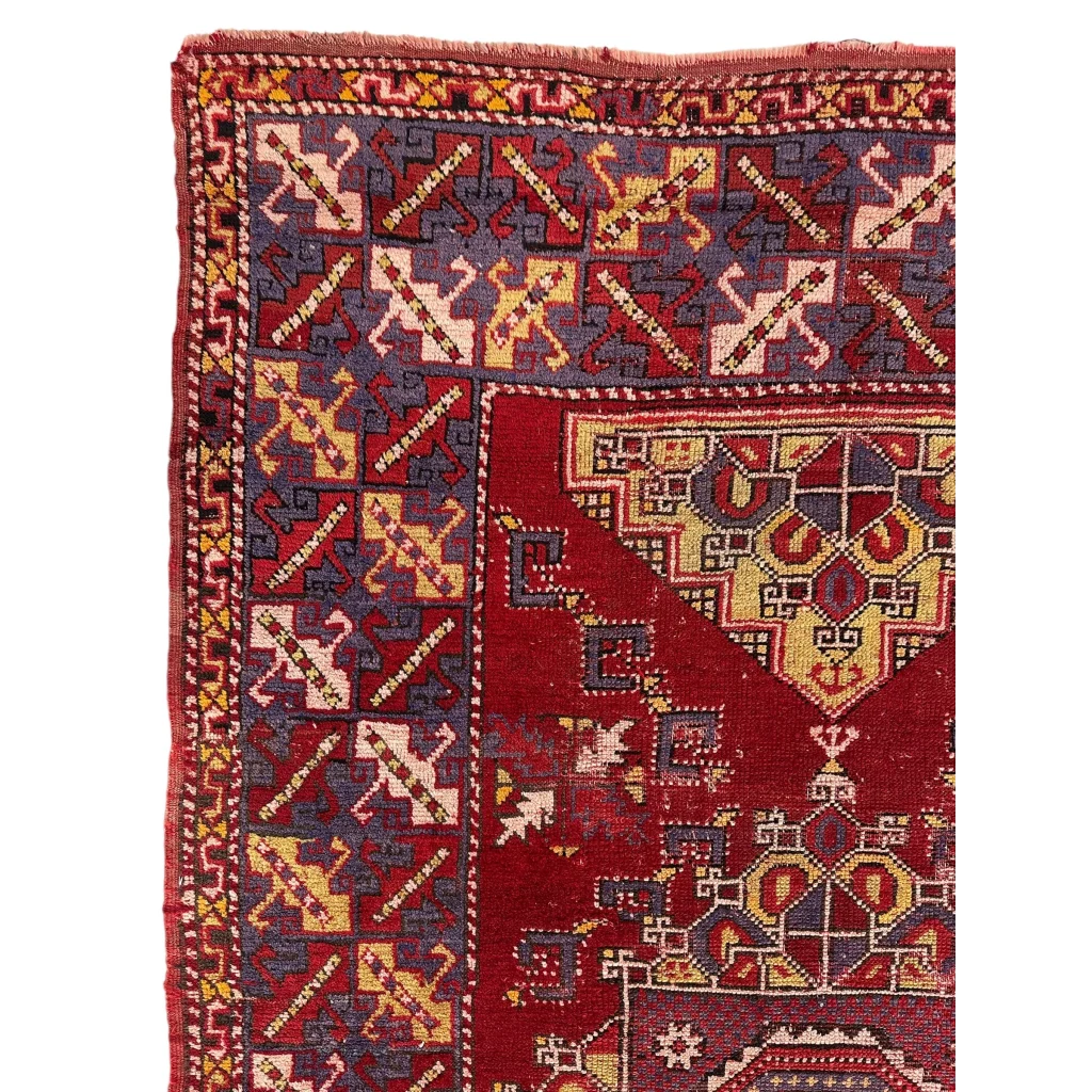 Stunning Anatolian tribal rug with bold red medallion and intricate motifs