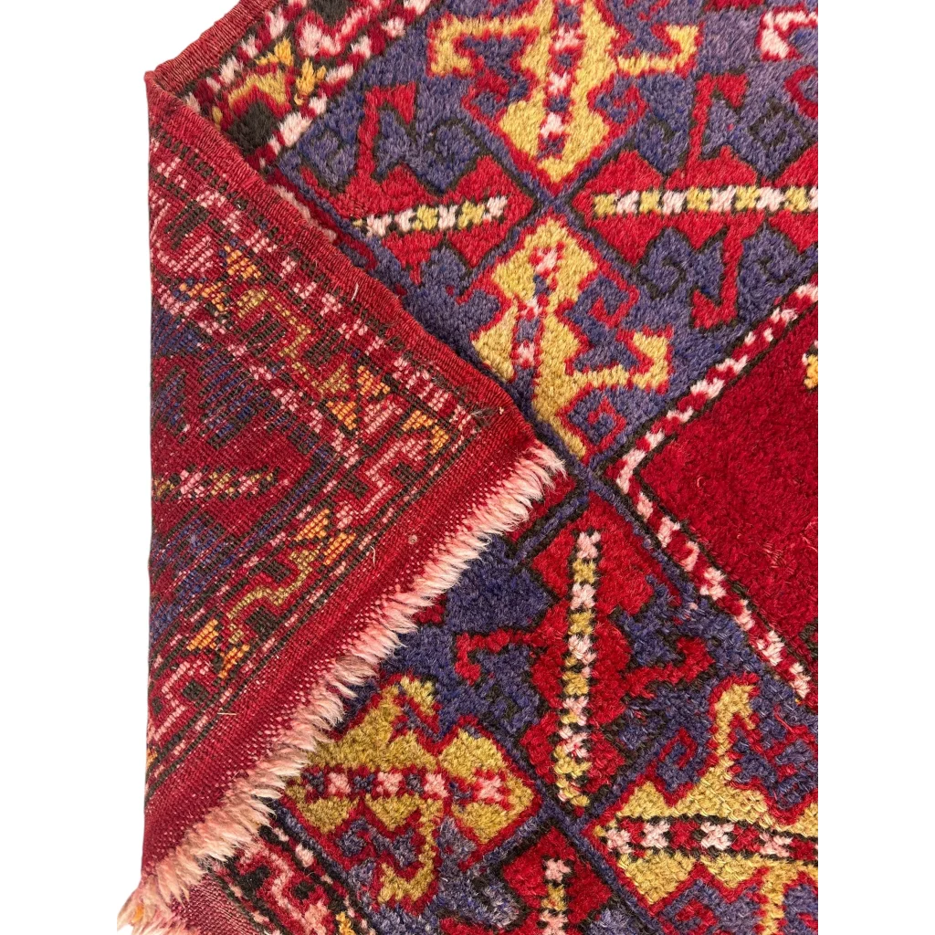 Stunning Anatolian tribal rug with bold red medallion and geometric patterns