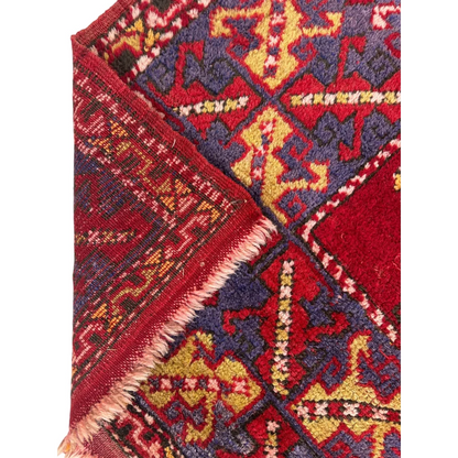 Stunning Anatolian tribal rug with bold red medallion and geometric patterns