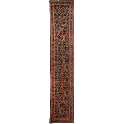 Stunning antique Caucasian wool runner rug with intricate floral patterns
