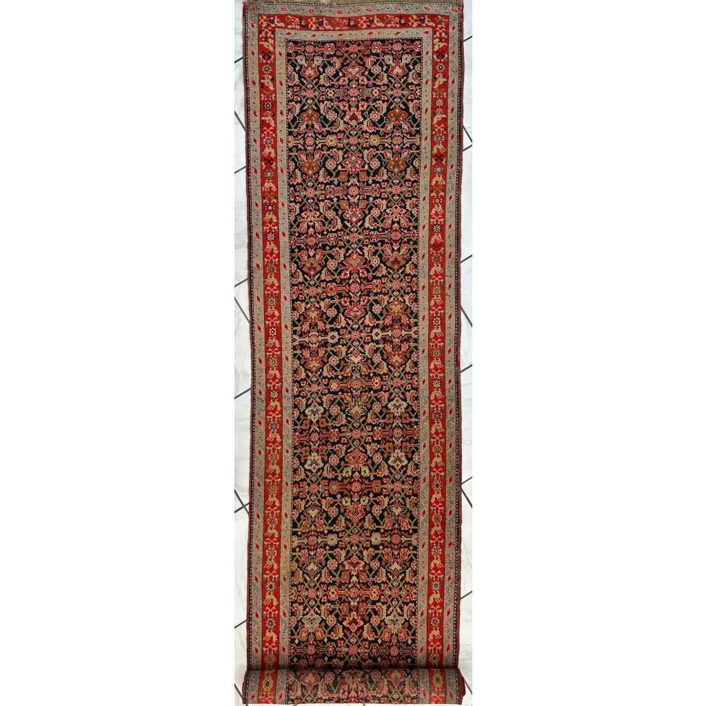Stunning antique Caucasian wool runner rug with floral patterns