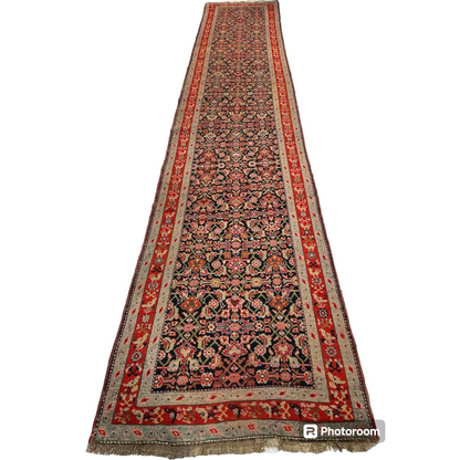 Stunning antique Caucasian wool runner rug with floral patterns