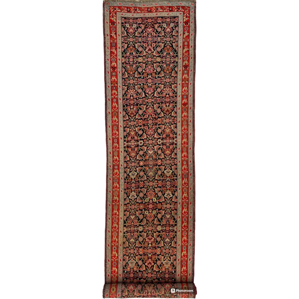 Stunning antique Caucasian wool runner rug with intricate floral patterns