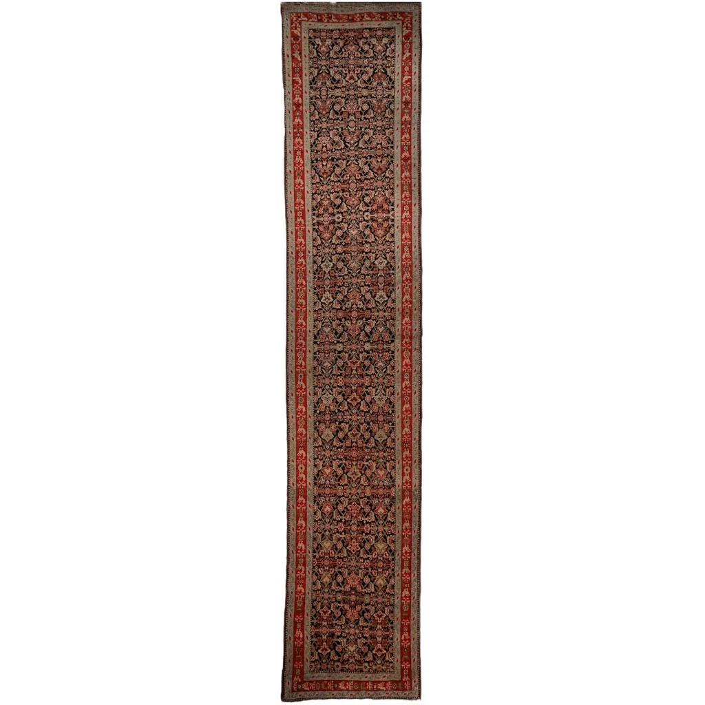 Stunning antique Caucasian wool runner rug in deep red tones