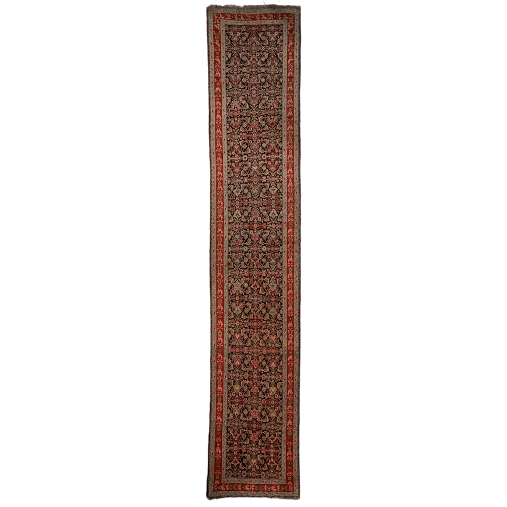Stunning antique Caucasian wool runner rug with floral patterns