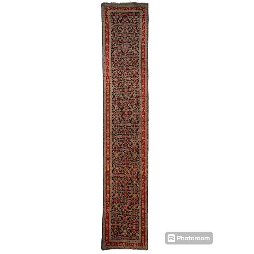 Stunning antique Caucasian wool runner rug with floral patterns