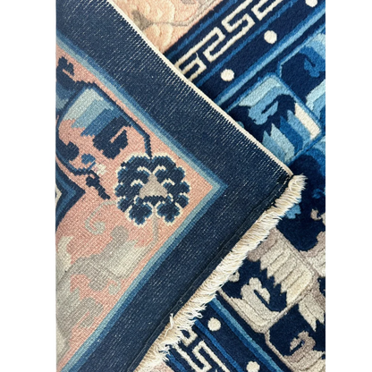 Stunning antique Chinese Peking rug in navy blue with peach geometric floral patterns